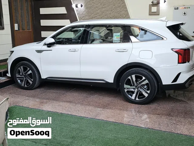 سورنتو موديل 2023 رقم بغداد باسمي لون ابيض