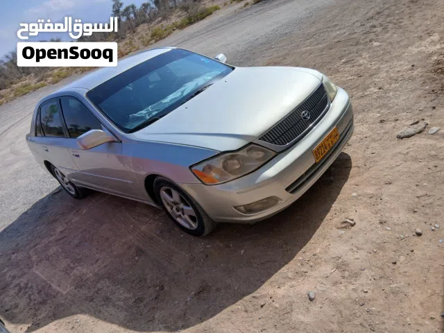 تويوتا افالون 2000 موديل رمادي مع مواصفات أمريكية وكهربائية