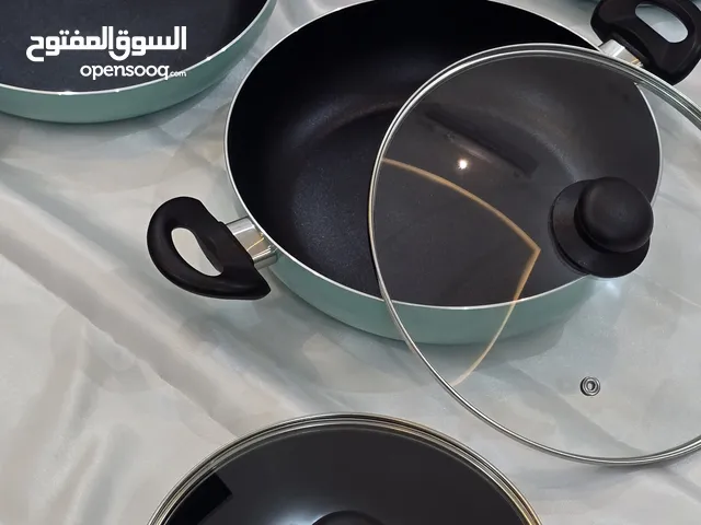 طقم أدوات طهي مصنوعة من الألومنيوم