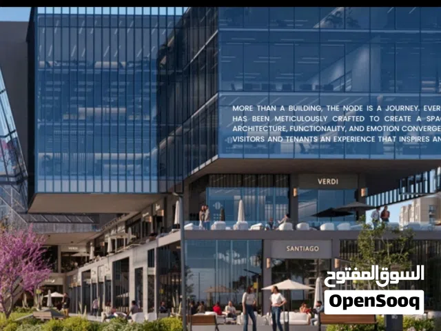 محل أرضي واجهة على محور محمد نجيب بمقدم 2.5 مليون The NODE MALL NTG Developments