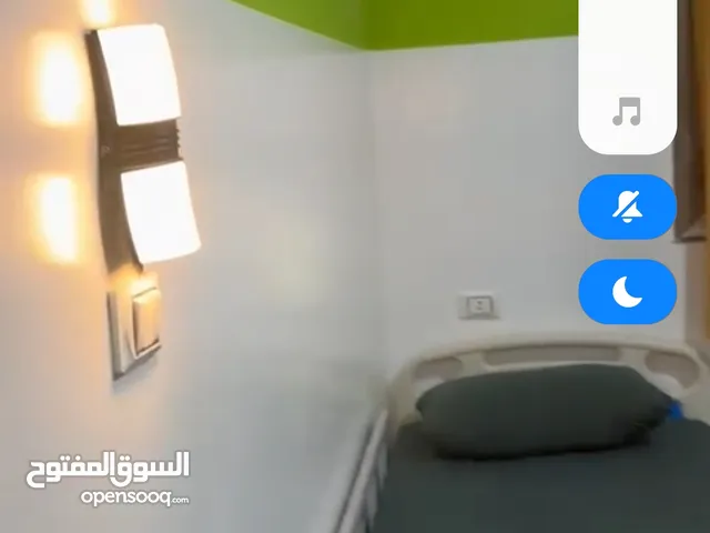 مبنى تجاري استثماري له مدخول للبيع في مدينة #الخمس على الطريق الساحلي مباشرة المساحة : 480 متر