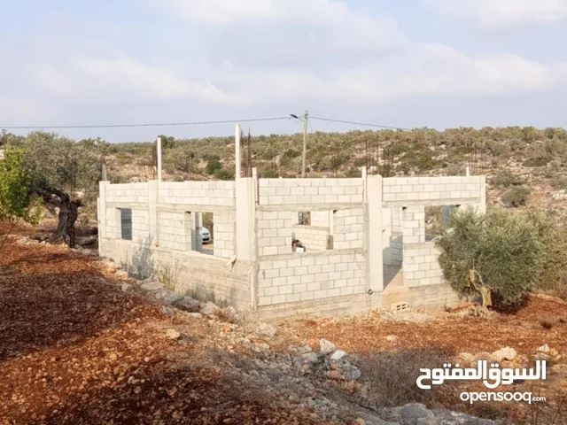 قطعة ارض مع بيت عظم للبيع