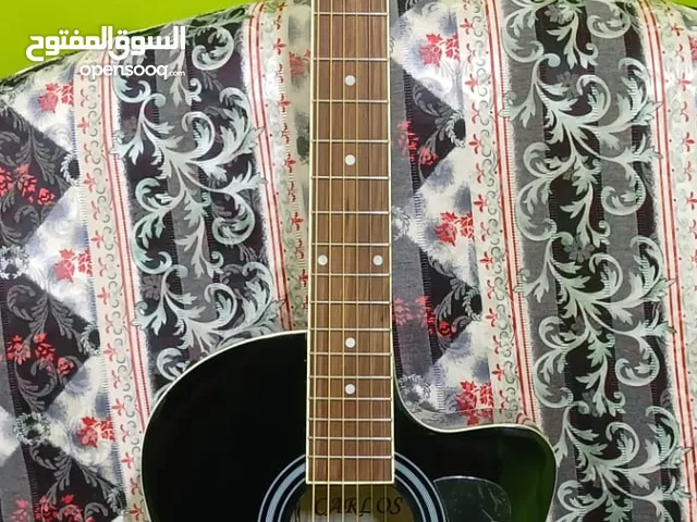 Carlos Guitar best new good condition less used
