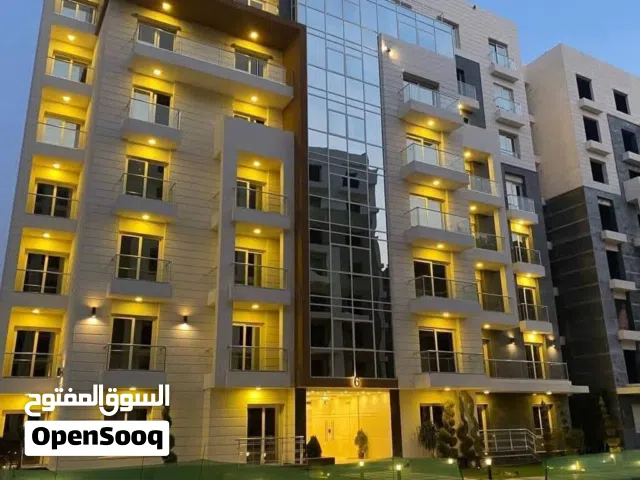 شقة للبيع في العاصمة الإدارية استلام فوري بالمقدم ففط وخصم الكاش 50% في حي ال R7 على المحور المركزي