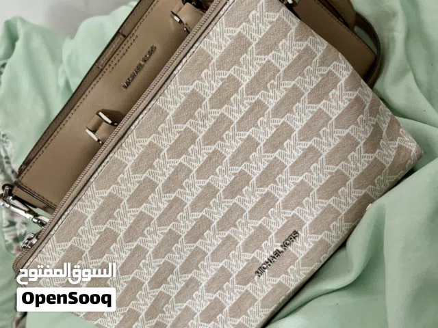 Beige Michael Kors for sale  in Abu Dhabi