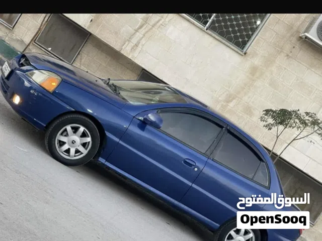 2005 كيا ريو Standard