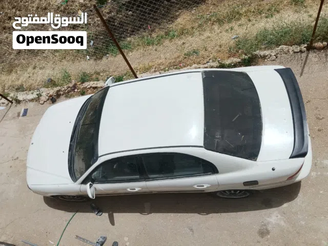 2005 كيا اوبتيما Standard