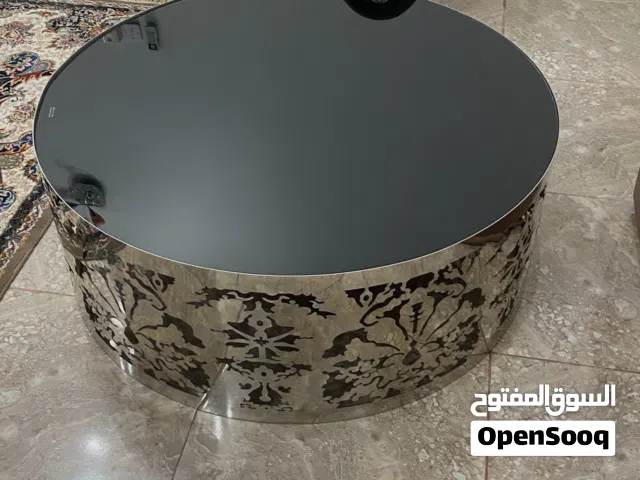 طاولة زجاجي