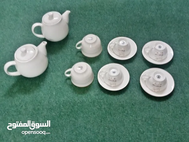 طقم قهوة  أكواب صحون 2 ابريق  مصنوع من الخزف