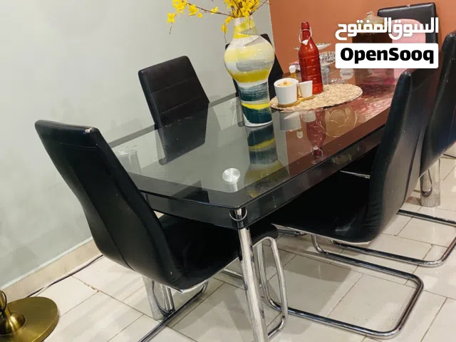 Glass table with 6 chairs