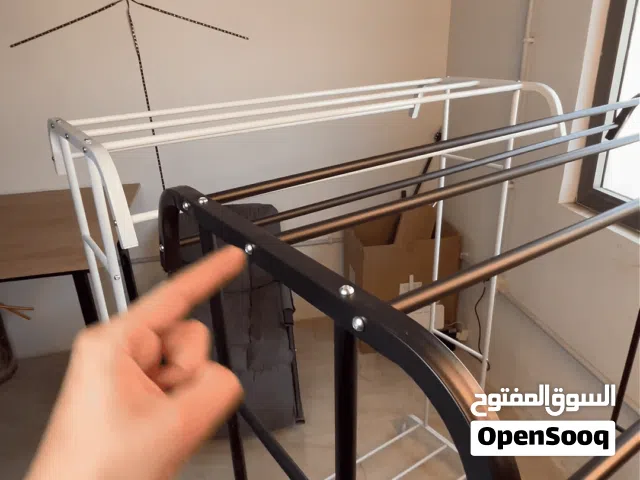 ستاند الملابس المطور بنظام التخزين المزدوج