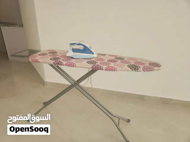 مكوى و طاولة كوي