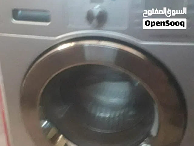غسالة توماتك 13 كيلو استعمال مره فقط جديده