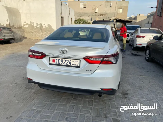 camry 2023 white colour daily and weekly rent