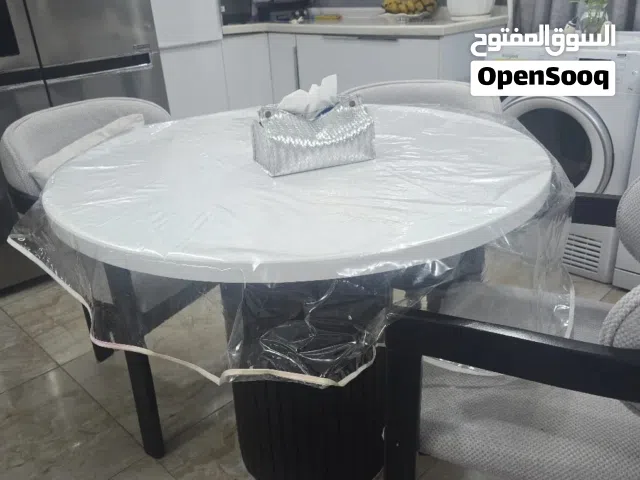 ميز طعام دائري خشب زان 4 كراسي
