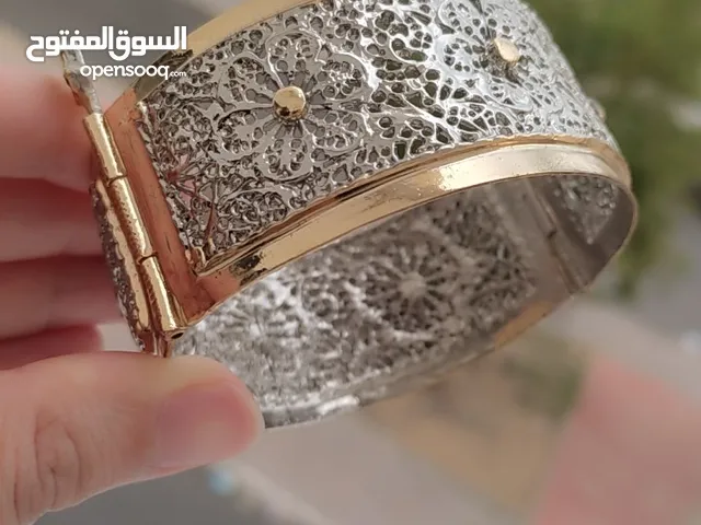 أساور نسائية نوعية جيدة جدا. برونز حر مشلل بالفضة و الذهب