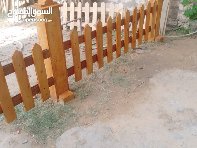 سياج خشب للحدائق