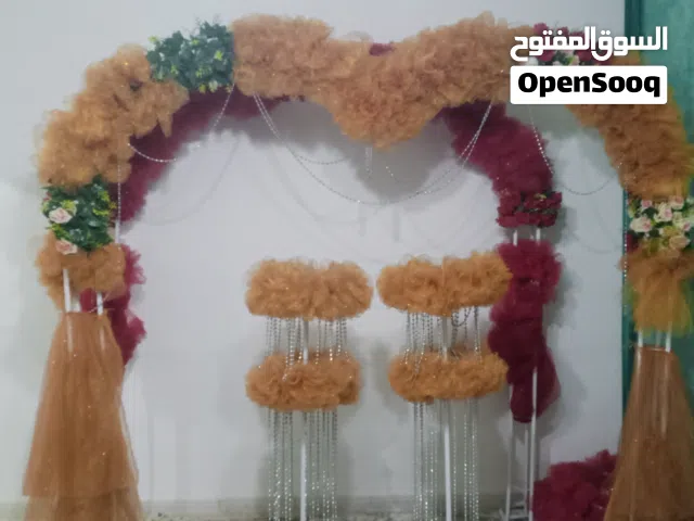 قوس ديكور ورود مع حاملات ورود للبيع