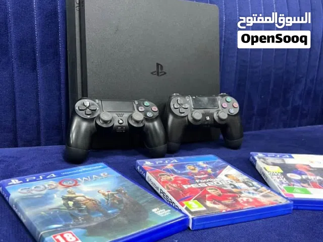 Playstation 4 slim avec 2 manettes et fifa24 et Pes24