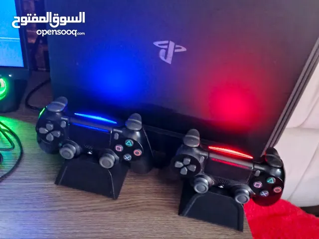 ps4 pro 1t (1000 g) مع ايدتين اصليات مع قاعدة فيها مدخلين شكن مع نكان لتثبيت البلايستيشن للمزيد وصفو