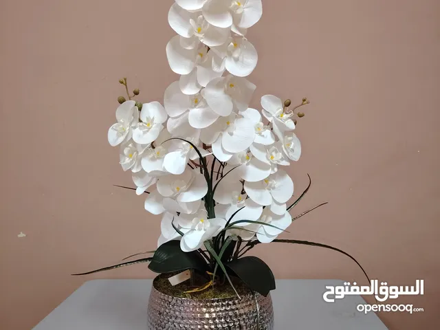 فازات استيل تركي مع زهور الاوركيدة الصناعي