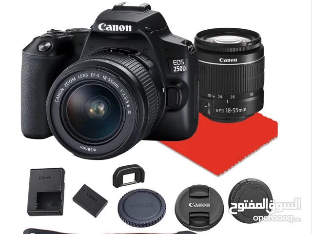 كاميرا canon250 d مستعمل شبه جديد مع كامل معداتها للبيع