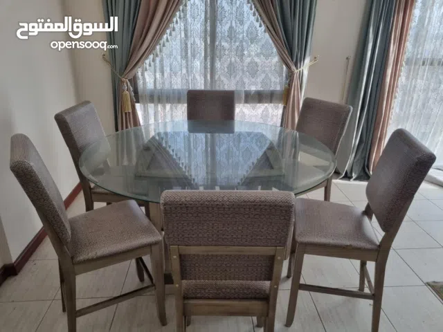 طولت طعام مودرن عدد 8 كراسي بحالة ممتازة جدا ممكن وضعها في حديقة المنزل