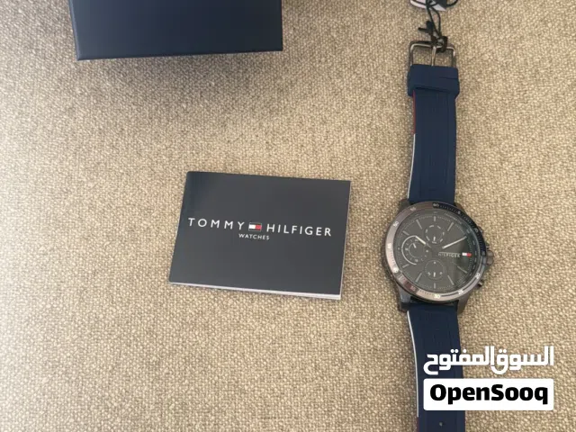 Tommy Hilfiger men's sport watch with 46mm case, navy dial, and blue silicone band.