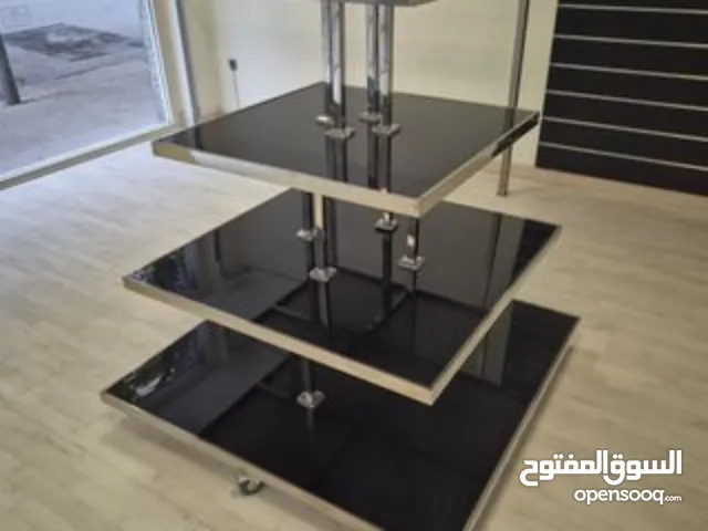 رفوف خشب بقواعد ستانليس