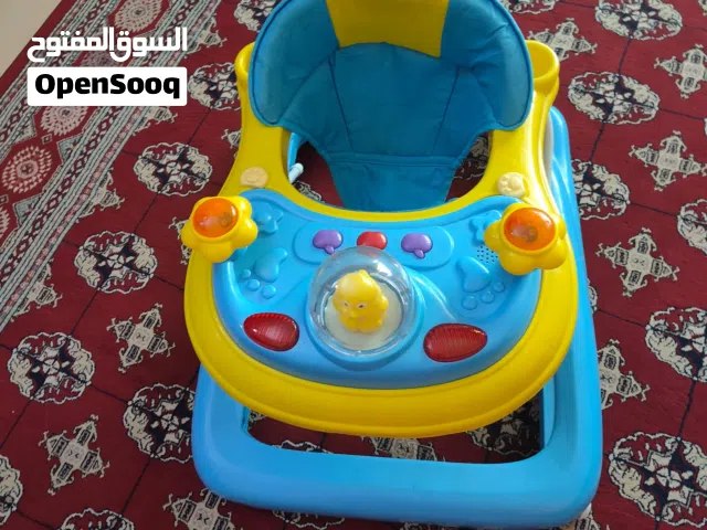 Juniors kids stroller and round walker good condition both 13bd