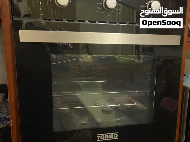 كوشة تشتغل بلغاز 60/60 غاطسة في دولاب المطبغ يوجد بها مروحة شفط