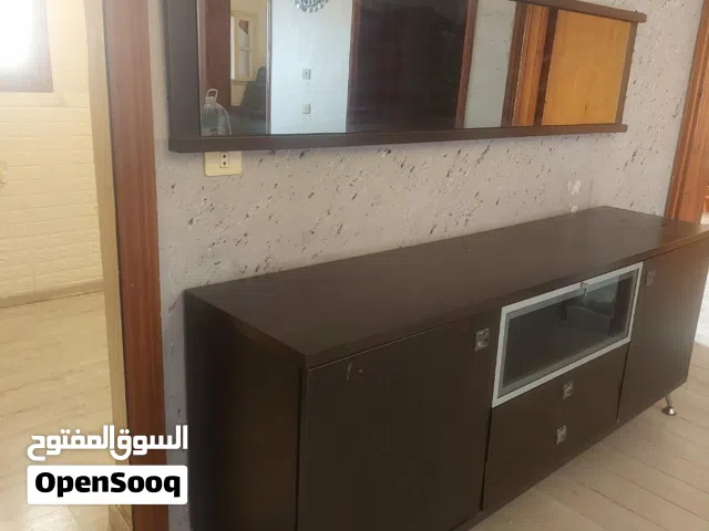طقم أثاث خشبي مستعمل بحالة جيدة (خزانة + بوفيه مع مرآة + مكتبة)