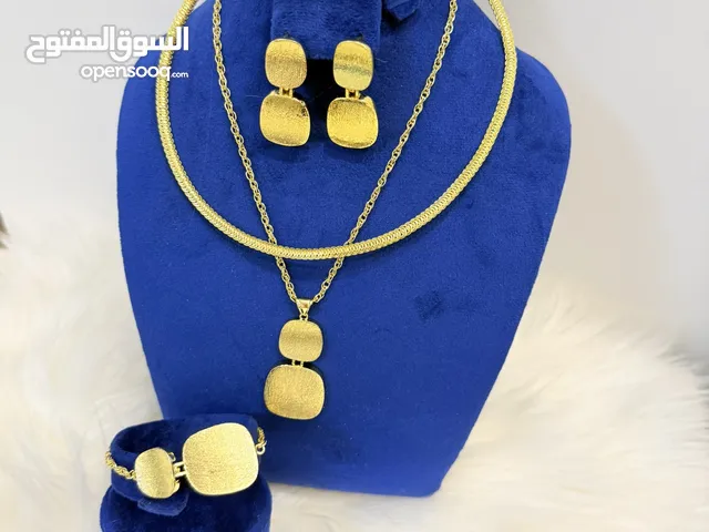 طاقم شغل ذهب لون تابث