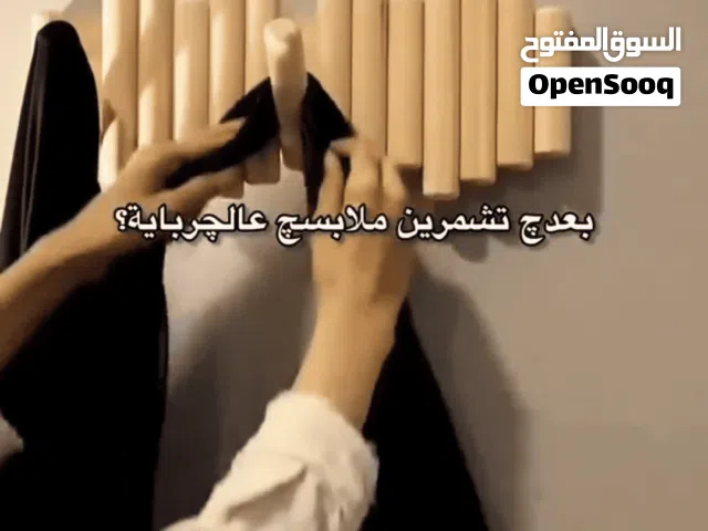 تعلاگة ملابس خشبية