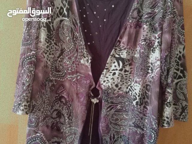ملابس بسعر دينار