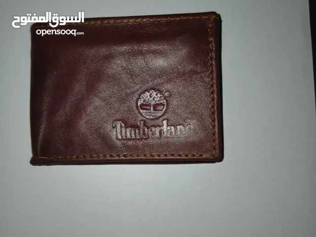 محفظة رجالي تنبررلاند هاي كوبي بلون بني
