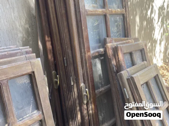 مجموعة نوافد وبيبان خشب زان  بدون اقفاص