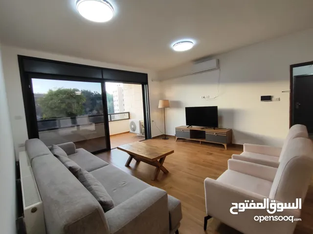 شقة جديدة مفروشة مع حديقة للإيجار – عين منجد  شارع إسكان المهندسين