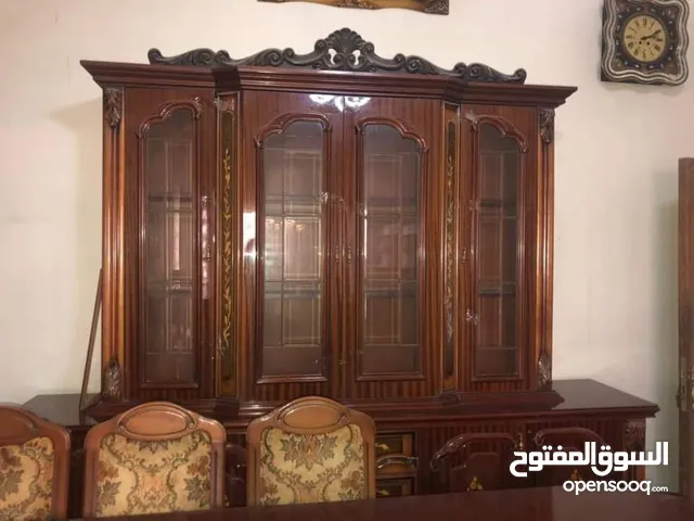 2 بوفيات و ميز طعام و 8 كراسي خشب صاج اصلي