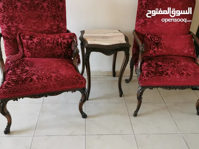 Solid wood carved chairs and marble table from pan emirates urgent sale