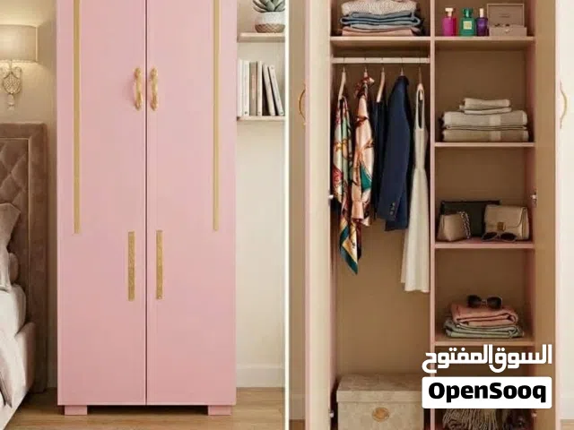دواليب فتحتين خشب ام دي اف   متوفر الوان
