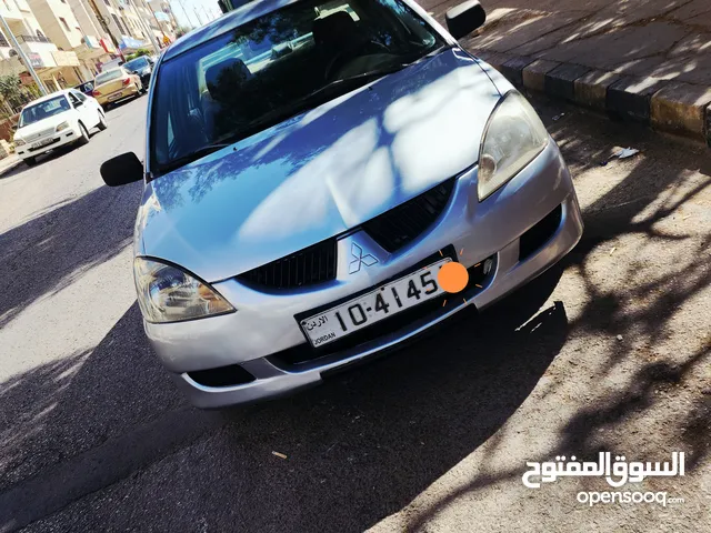 رقم مميز مع سياره لانسر هديه