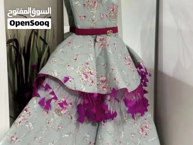 فستان من بوتيك رغداء الخطيب