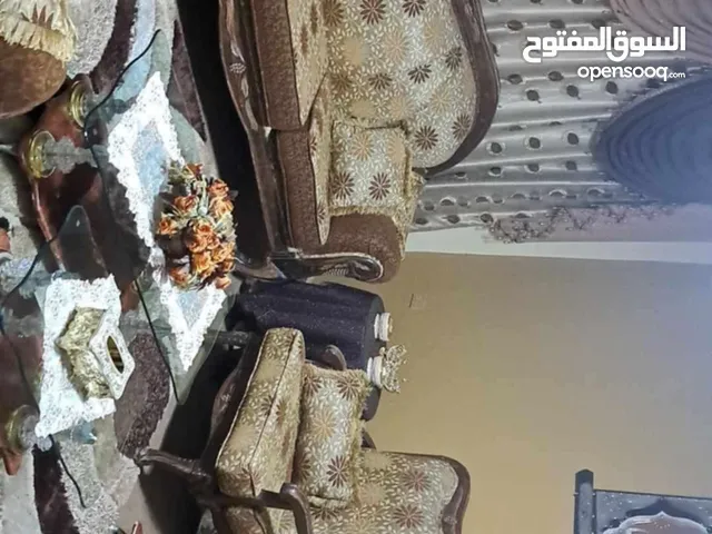 7 مقاعد كنب + بوفيه خشب + سجادة تركي + طقم طاولات + ستارة