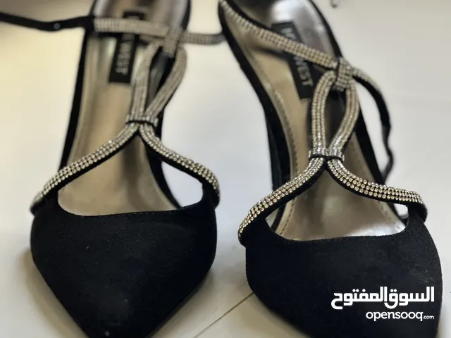 كعب ناين وست مخملي