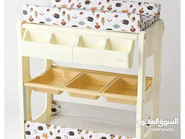 طاولة تبديل + حوض استحمام