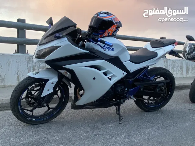 دراجة  2014 كاوازاكي نينجا  300cc  لون ابيض