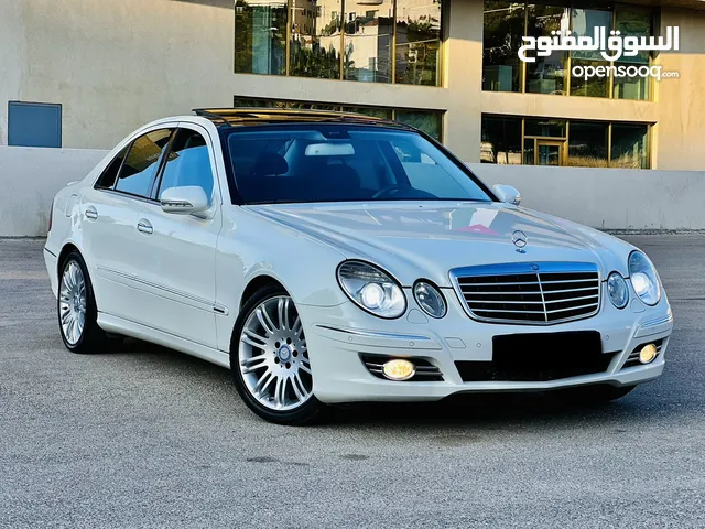 Mercedes E200 غرغوريه سبورت اصلي شبه جديده ممشى قليل مالك واحد فحص كرت ابيض