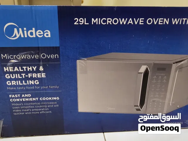 Brand new MIDEA microwave oven