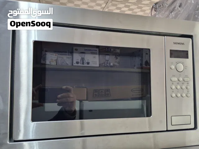 مايكرويف سيمنز 30 لتر بلد ان استانلس ستيل مع شواي مستخدم بحاله ممتازه جدا